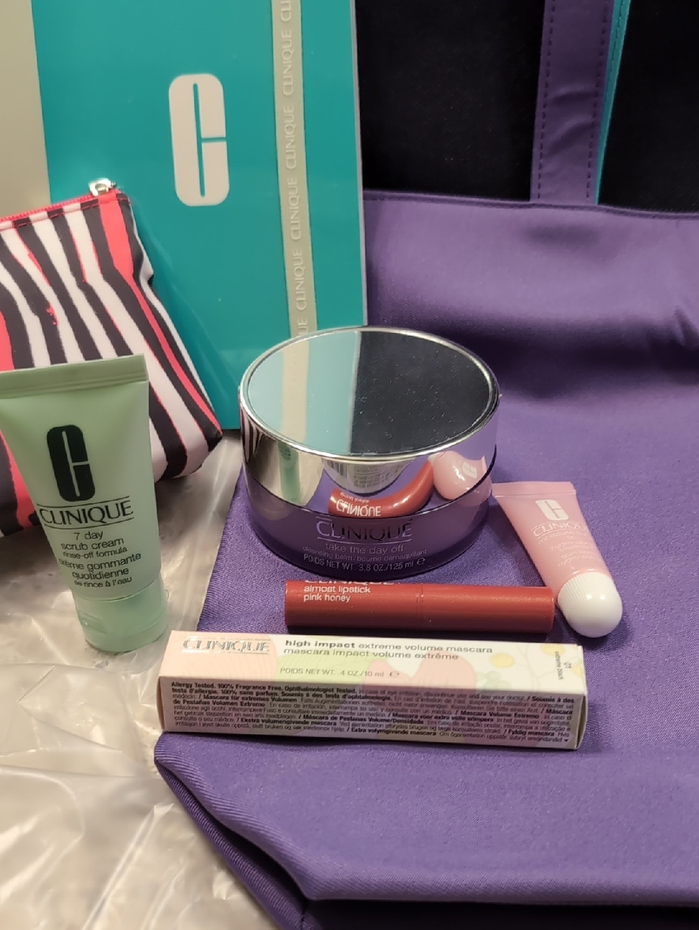 Clinique Gift Set with 3 Full Size, Cosmetic Bag, Tote Bag and Journal